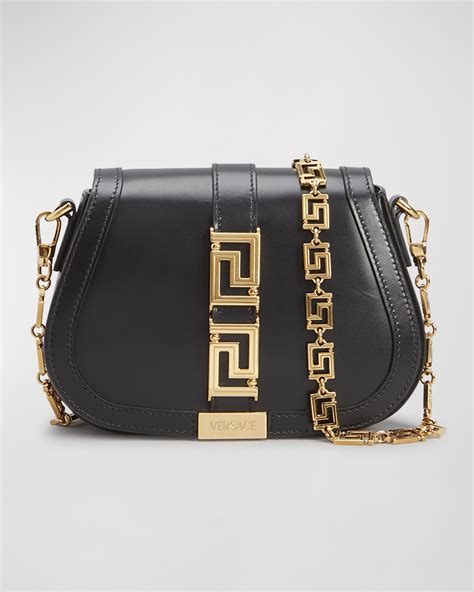 models carring the versace greca goddess small small shoulder bag